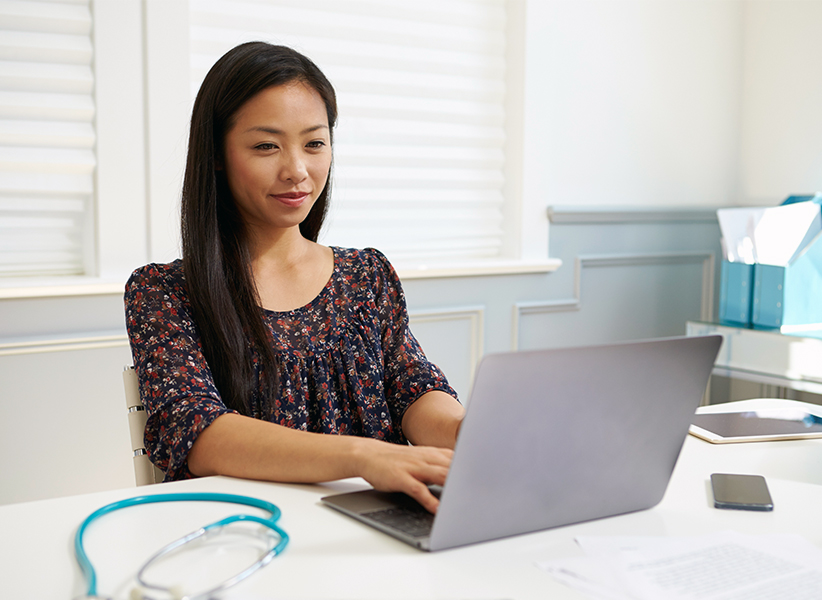 woman using laptop